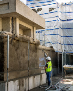 Planter shotcrete applied at UT East Facade by workers with Berglund Construction