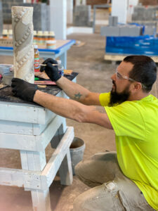 BAC craftworker performs stone patch on historic material during Historic Masonry Preservation Certification Program